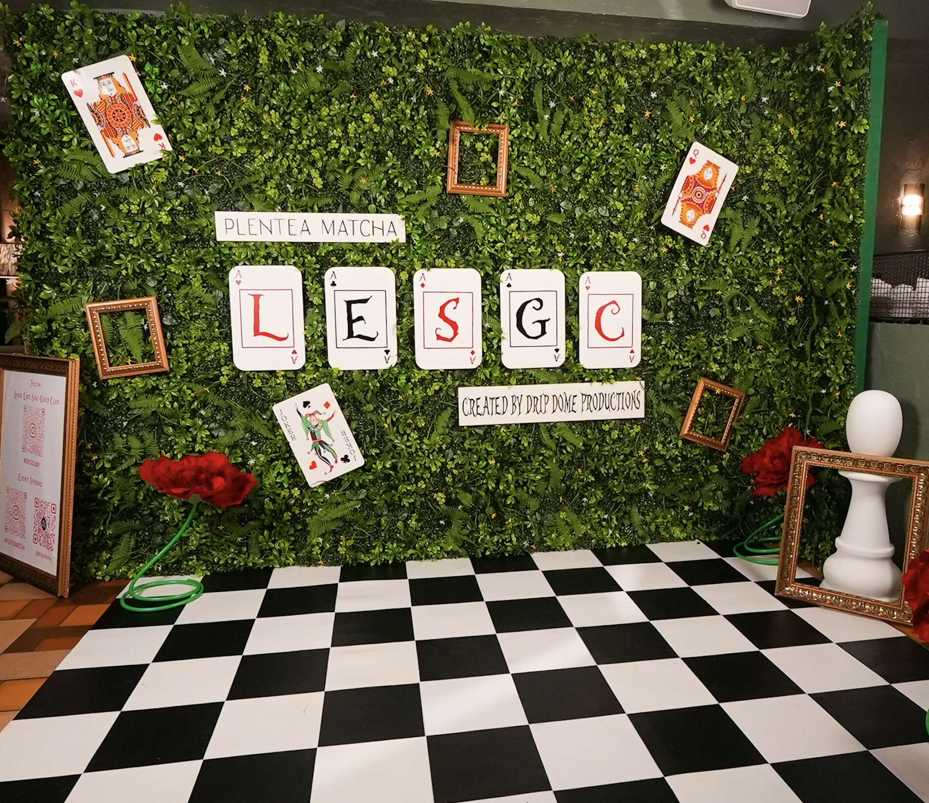 The finished Alice in Wonderland hedge wall set at the Lower East Side Girls Club gala, a near 1:1 match of the 3D render
